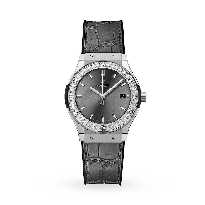 Hublot Quartz 33mm Men’s Watch with Grey Material Dial, Stainless Steel Case, 50m Water Resistant / 581.NX.7071.LR.1104.