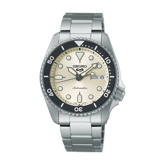 Seiko 5 Sports Automatic 38mm Men’s Watch with Cream Material Dial, Stainless Steel Case & Bracelet, 100m Water Resistant / SRPK31K1